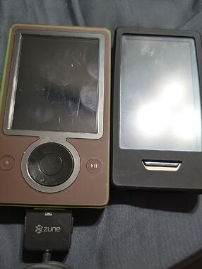 Microsoft Portable Media Player - Brown And A Silver One